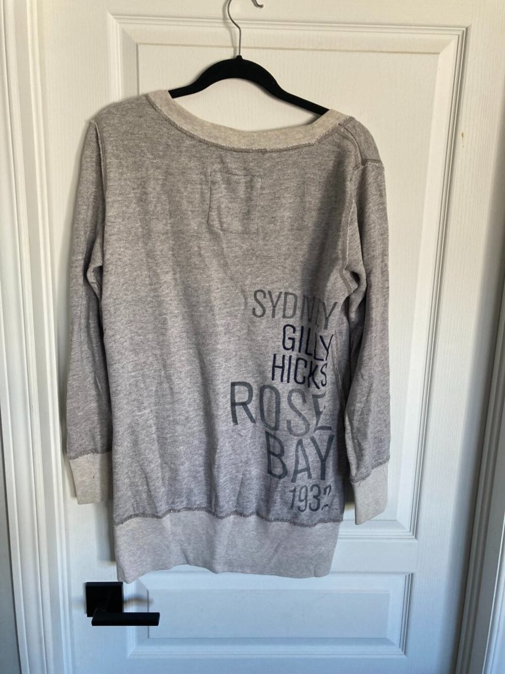 Gilly Hicks by Hollister  Long Sweater V-neck style with pockets in front